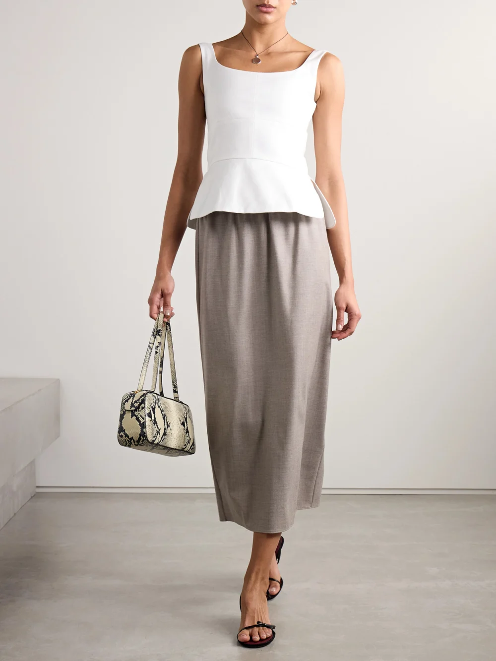 Liberowe Cotton-poplin Peplum Top, worn by a model