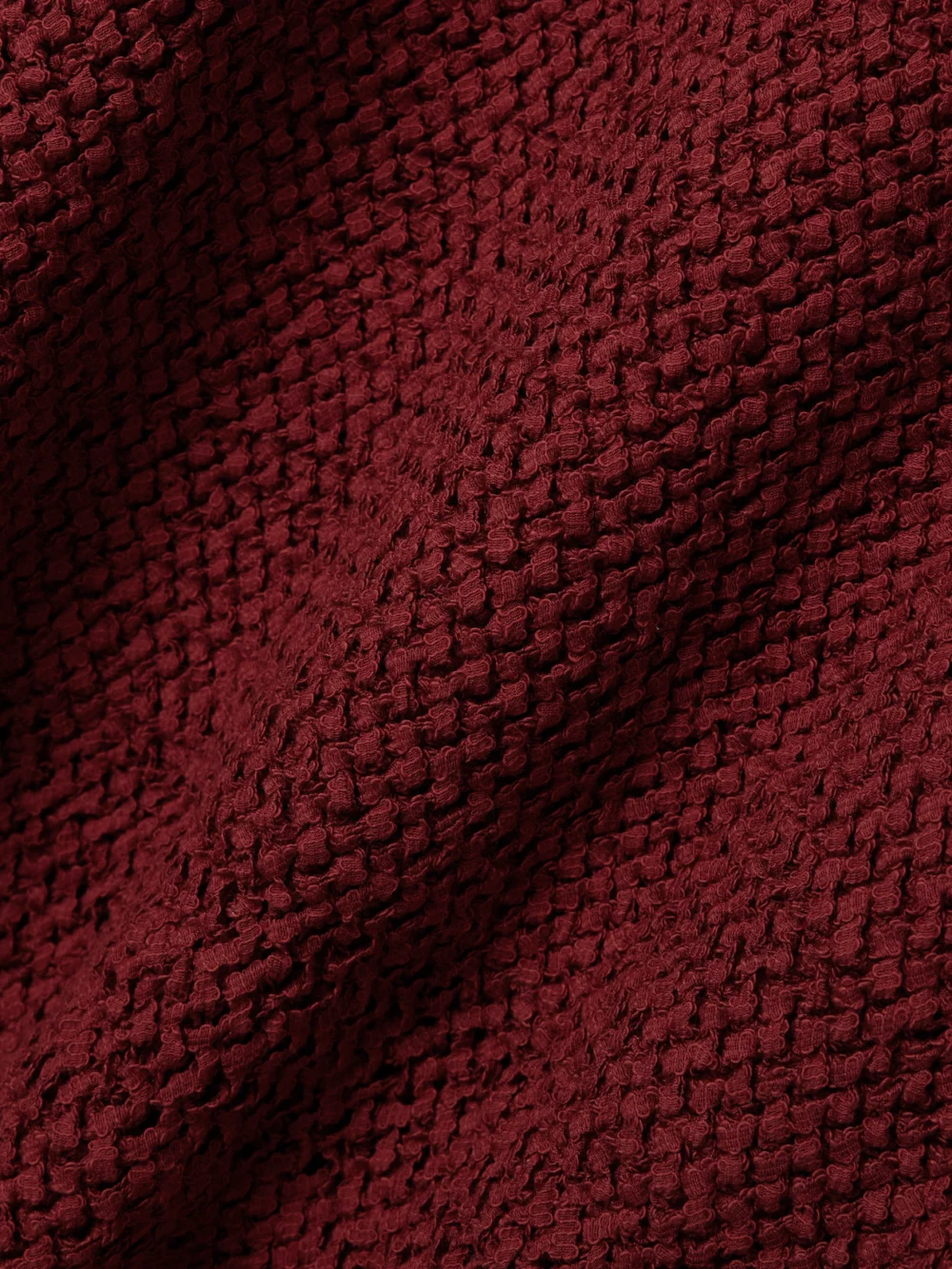 Close-up detail of the Liberowe Open-knit Organic Cotton-blend Midi Dress