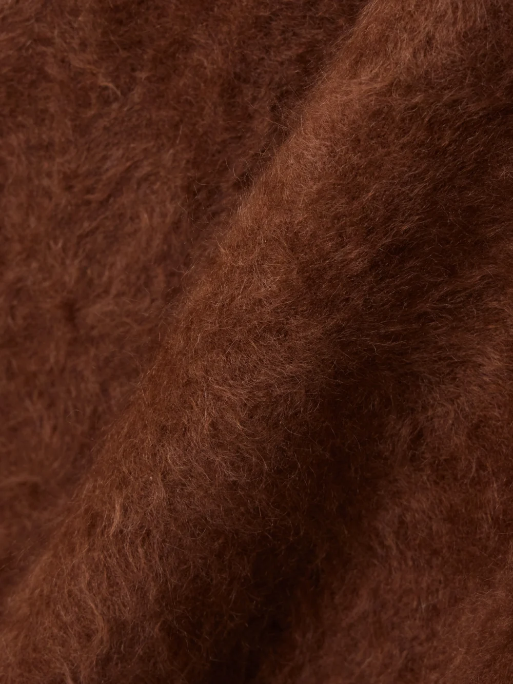 Close-up detail of the Lisa Yang Asta Brushed-cashmere Midi Skirt
