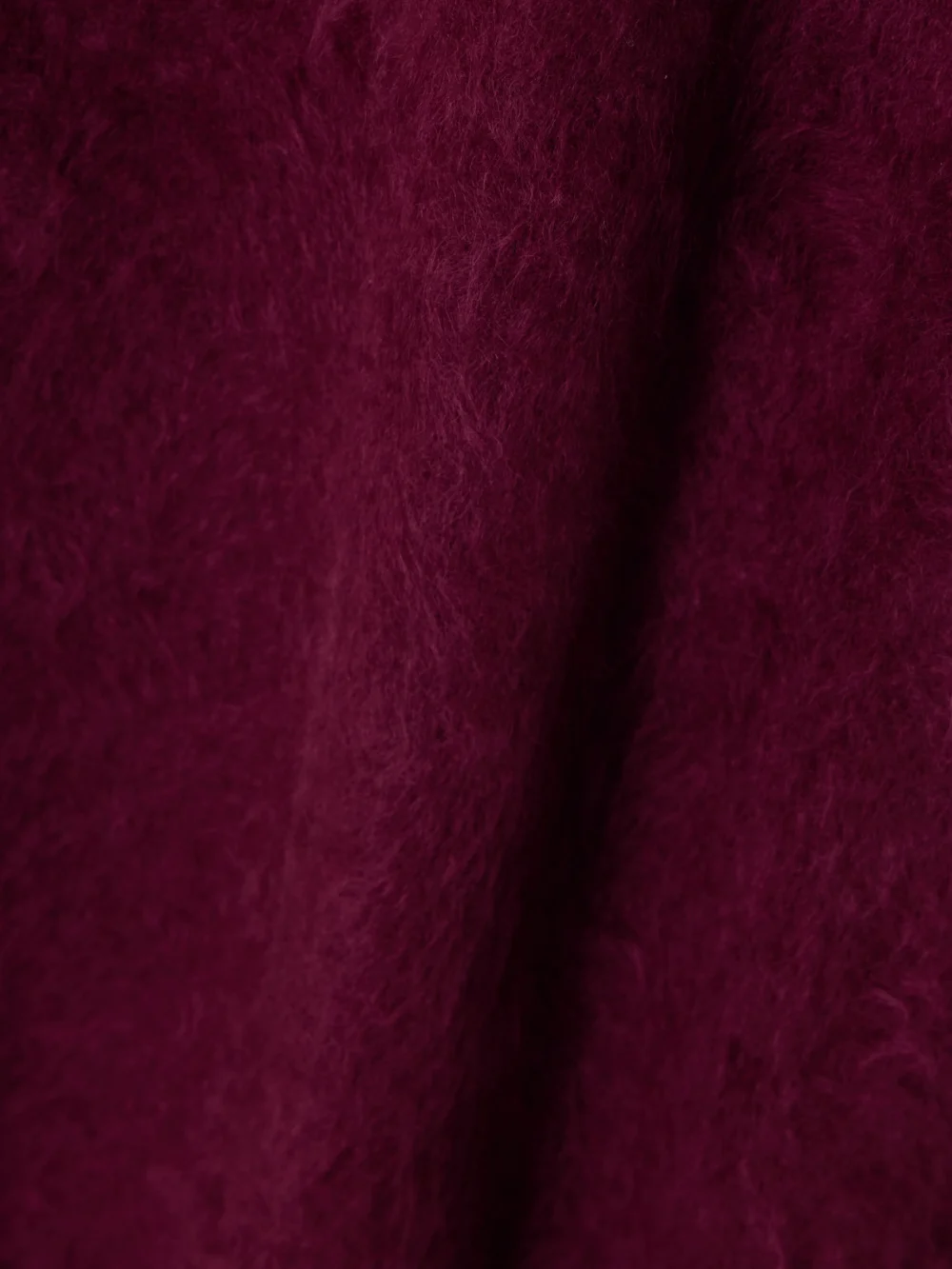 Close-up detail of the Lisa Yang Asta Brushed-cashmere Midi Skirt