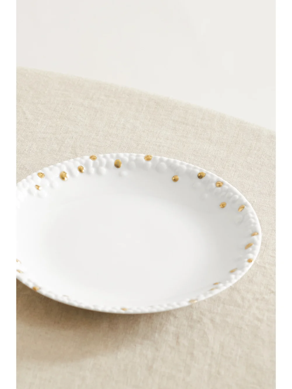 Back view of the L'Objet + Haas Brothers Mojave 17cm Gold-plated Porcelain Plate