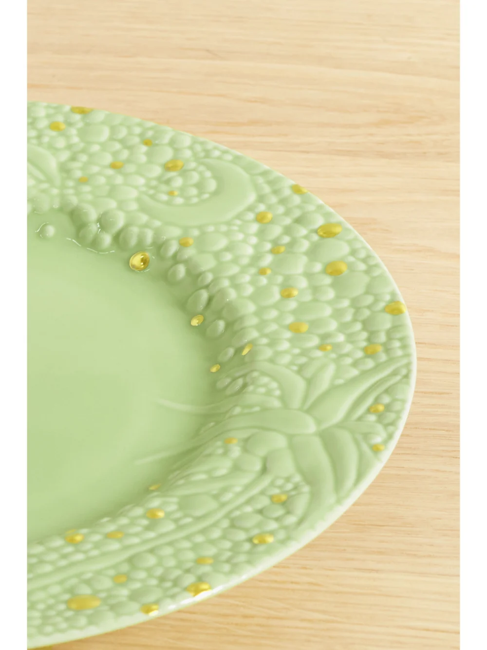 Close-up detail of the L'Objet + Haas Brothers Mojave Desert 32cm Gold-plated Porcelain Charger Plate