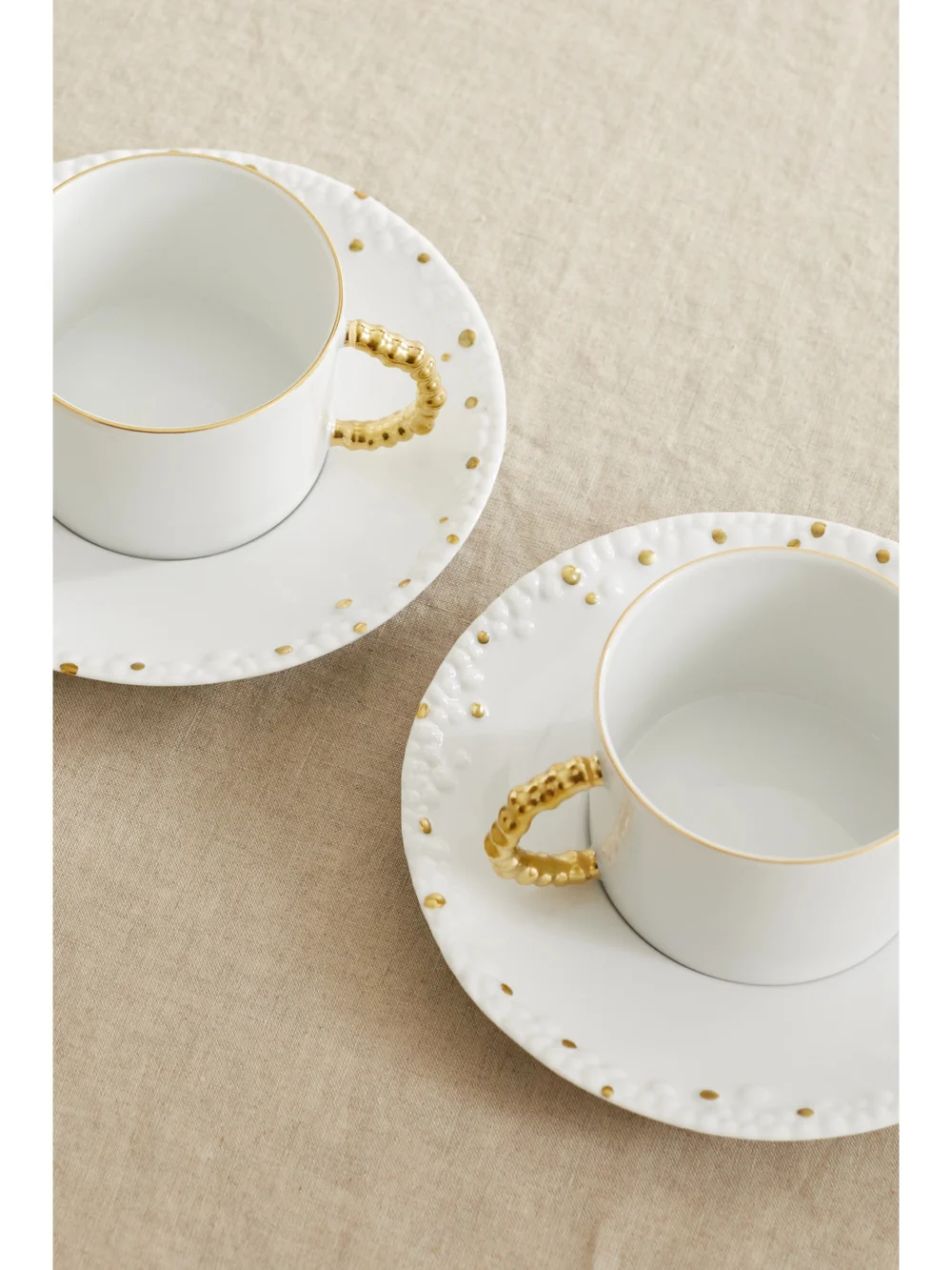 Back view of the L'Objet + Haas Brothers Mojave Set of Two Gold-plated Porcelain Tea Cups and Saucers