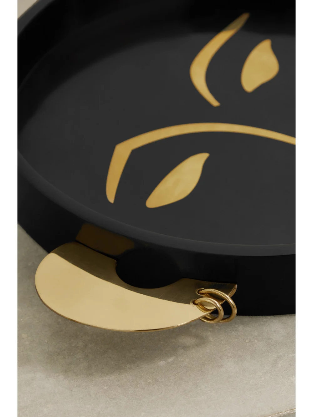 Close-up detail of the L'Objet + Kelly Behun Henri Resin and Brass Tray