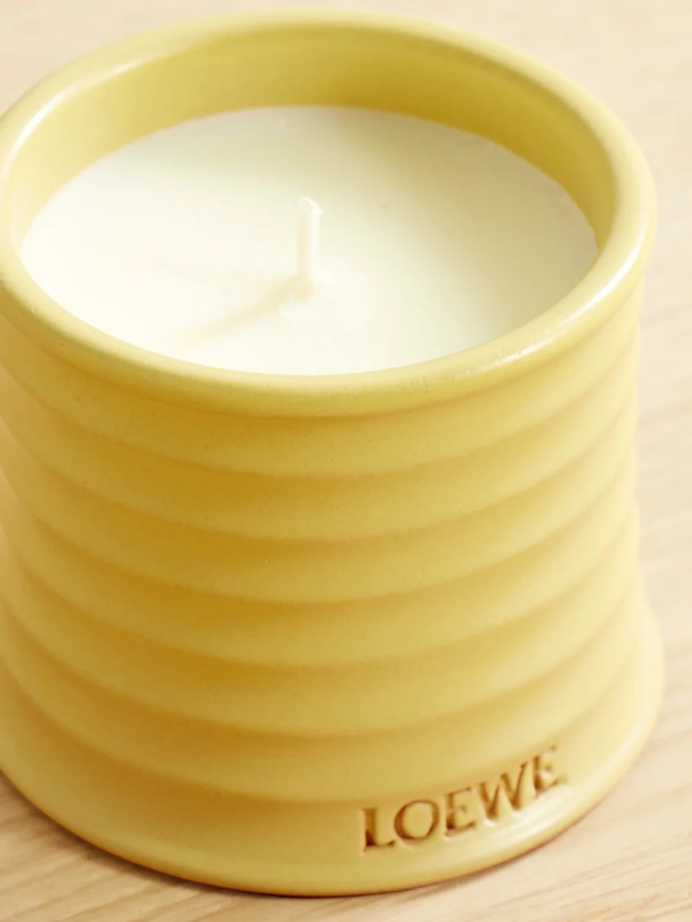 Close-up detail of the Loewe Perfumes Honeysuckle Small Scented Candle, 170g