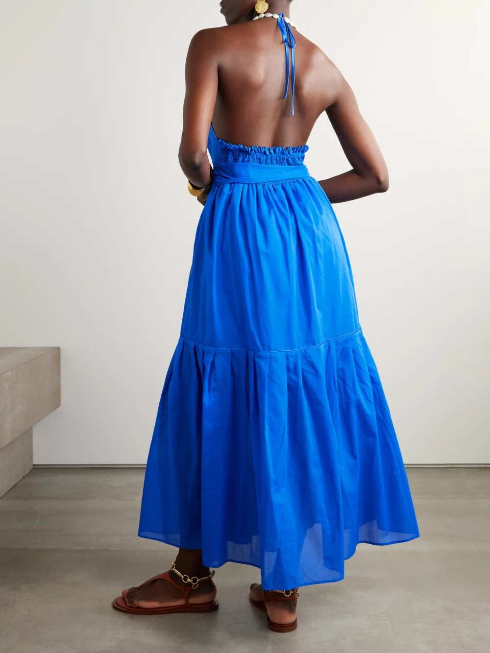 Back view of the Loretta Caponi Patmos Belted Tiered Cotton-poplin Halterneck Maxi Dress