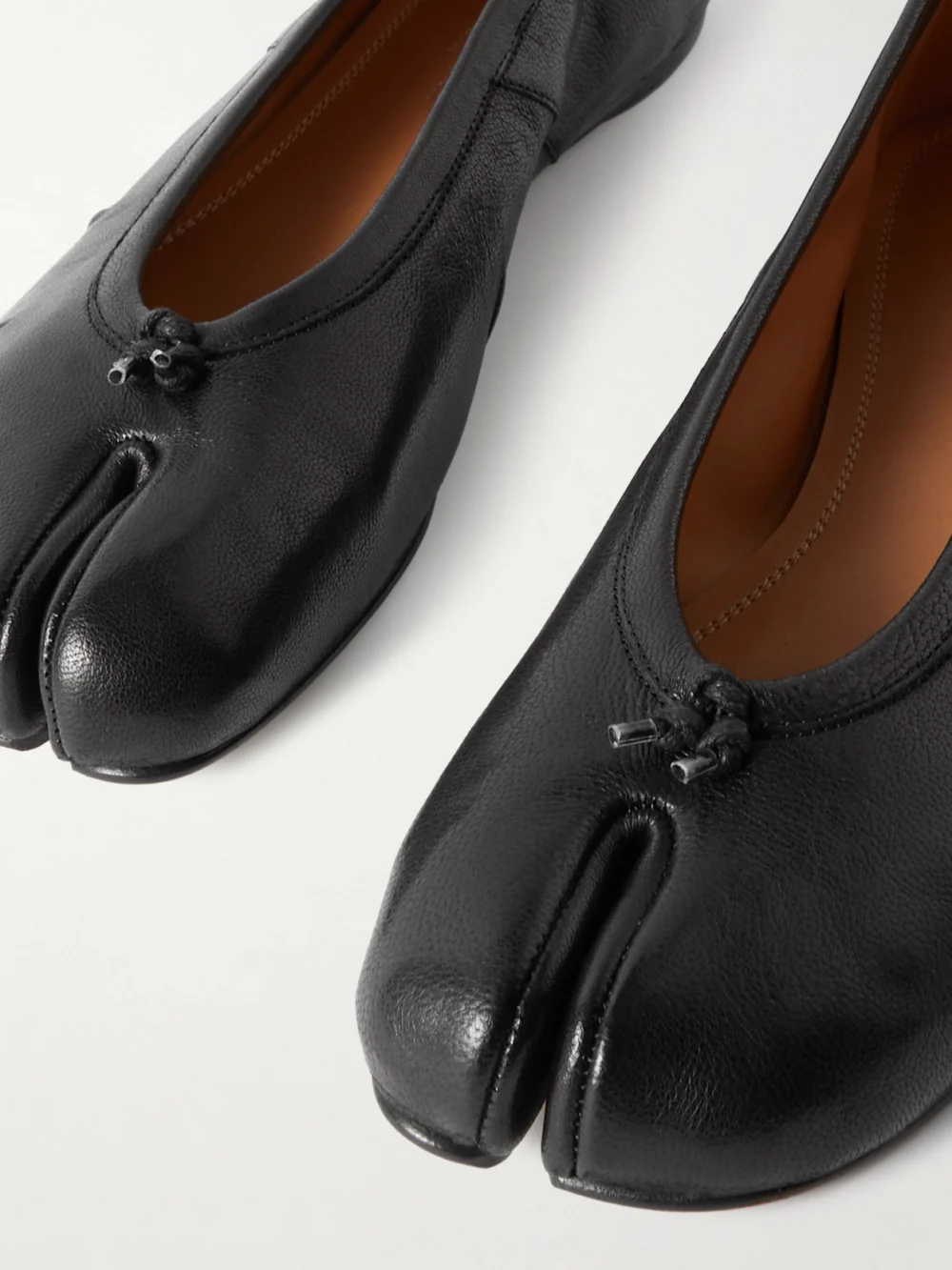 Close-up detail of the Maison Margiela Tabi Split-toe Textured Leather Ballet Flats