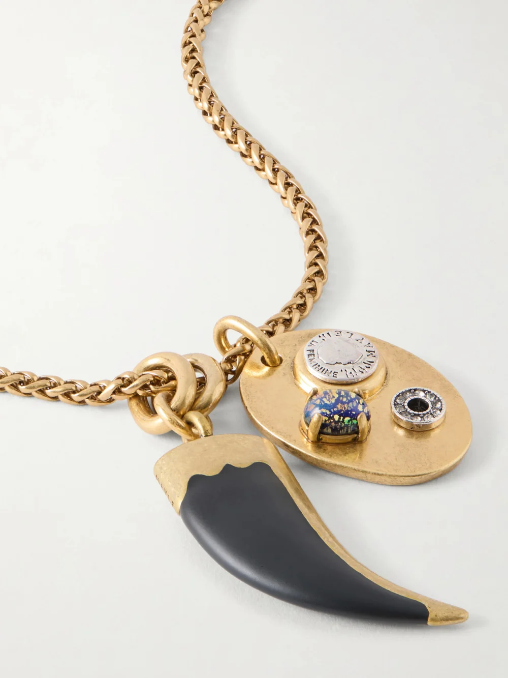 Close-up detail of the Maison Mayle Arpelle Horn of Plenty Gold-plated, Crystal and Enamel Necklace