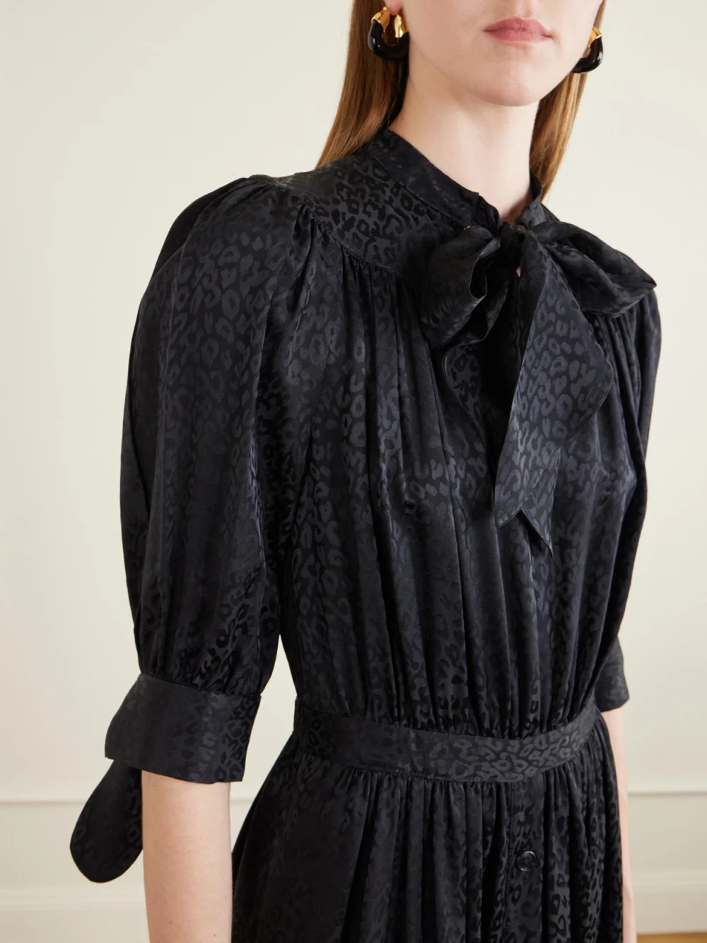 Close-up detail of the Maison Mayle Lala Leopard-jacquard Silk Midi Dress
