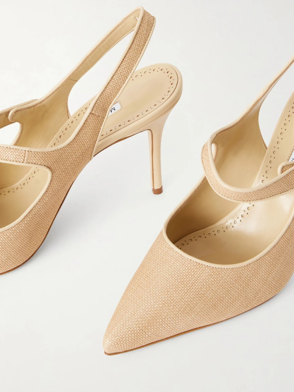 Close-up detail of the Manolo Blahnik Campari 90 Suede Slingback Pumps
