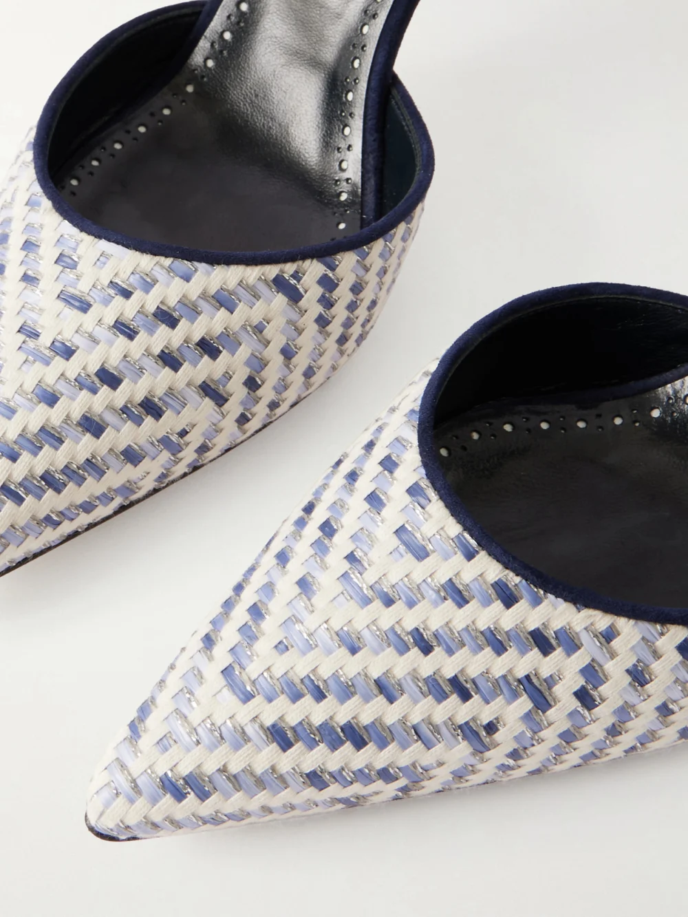 Close-up detail of the Manolo Blahnik Carolyne 70 Raffia Slingback Pumps