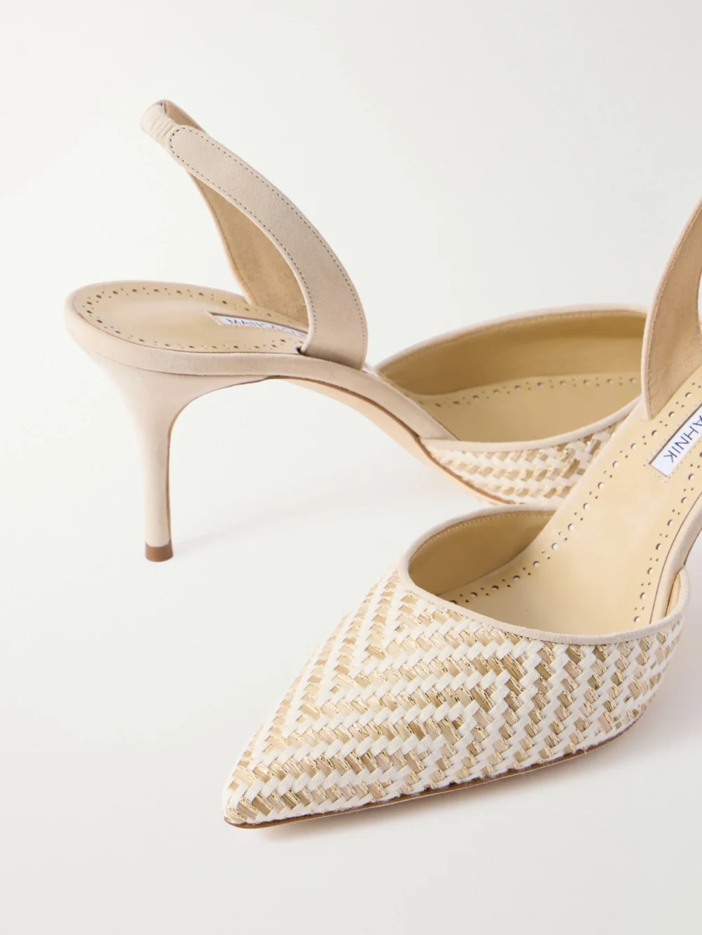 Close-up detail of the Manolo Blahnik Carolyne 70 Raffia Slingback Pumps