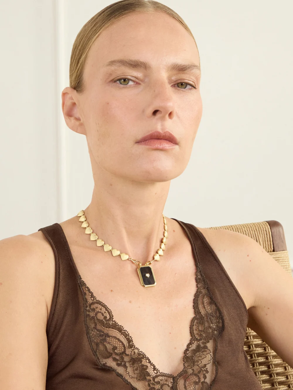 Marie Lichtenberg Heart 18-karat Gold, Ebony and Diamond Necklace, styled view
