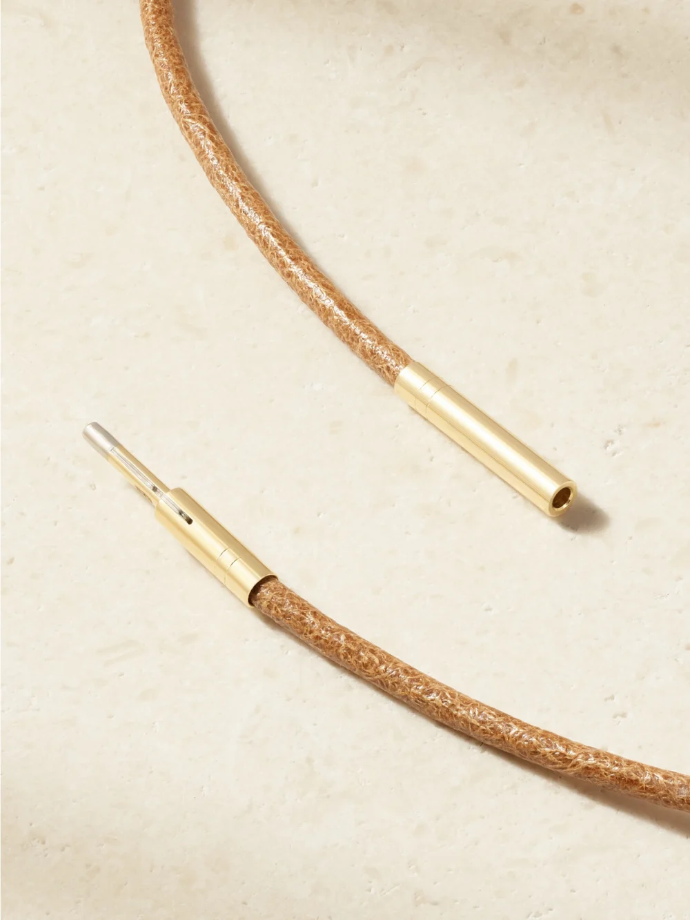 Back view of the Marie Lichtenberg Luck 18-karat Yellow and White Gold, Emerald and Leather Necklace