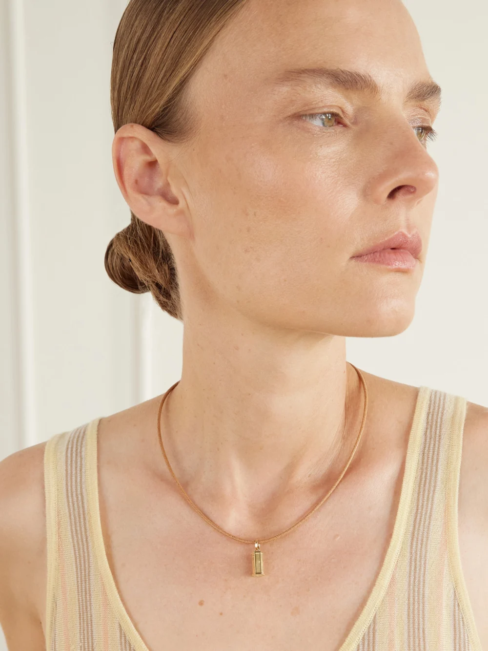 Marie Lichtenberg Micro Weight 18-karat Gold and Leather Necklace, styled view