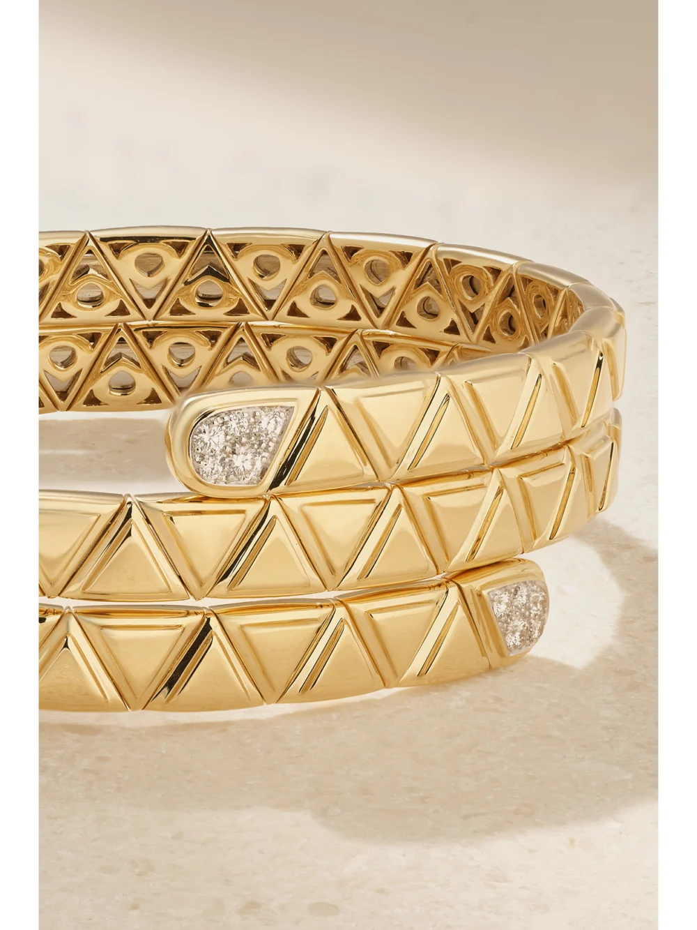 Close-up detail of the Marina B Triangolini Triple 18-karat Gold Diamond Bangle