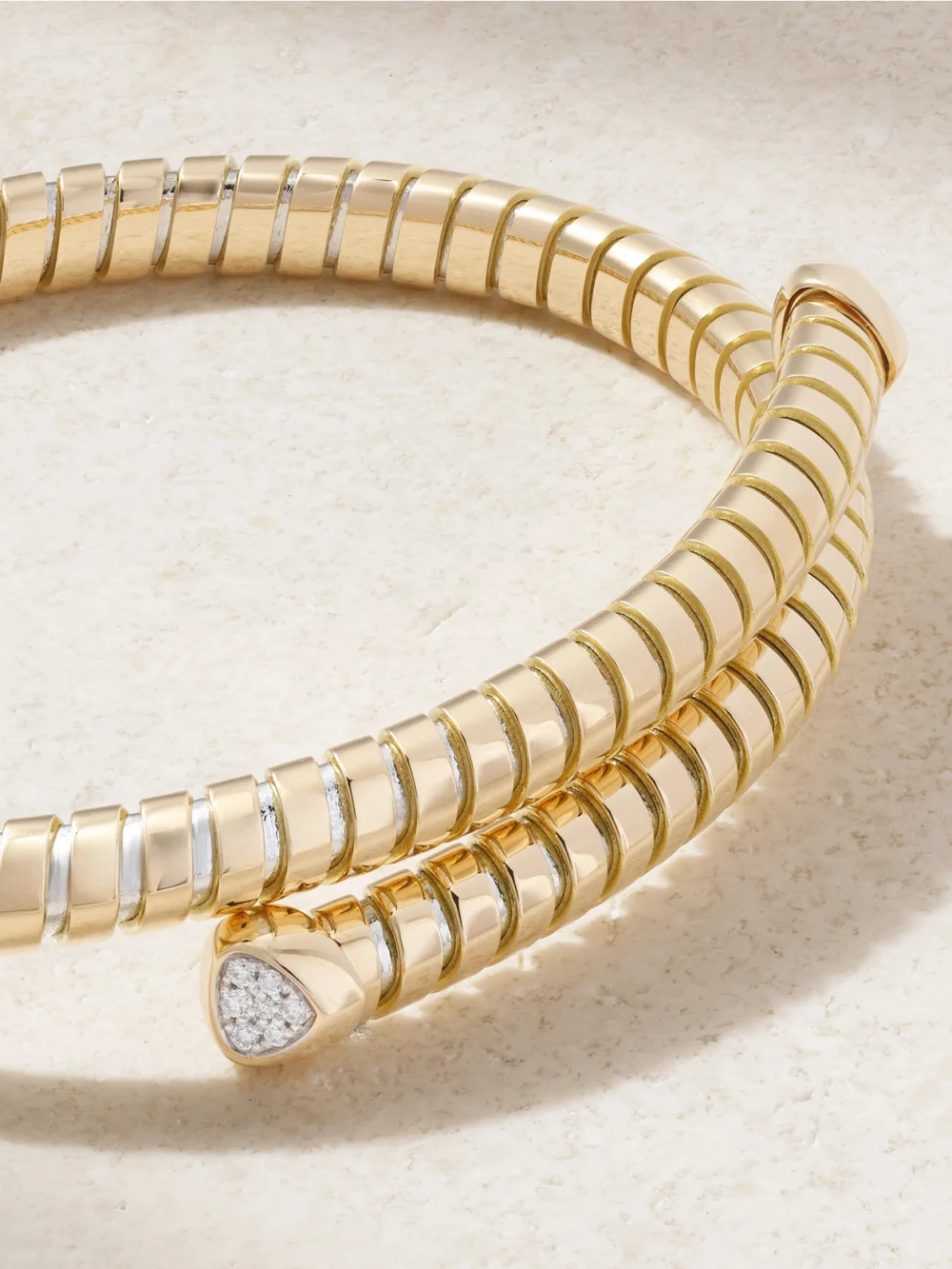 Close-up detail of the Marina B Trisolina Bypass 18-karat Yellow and White Gold Diamond Bracelet