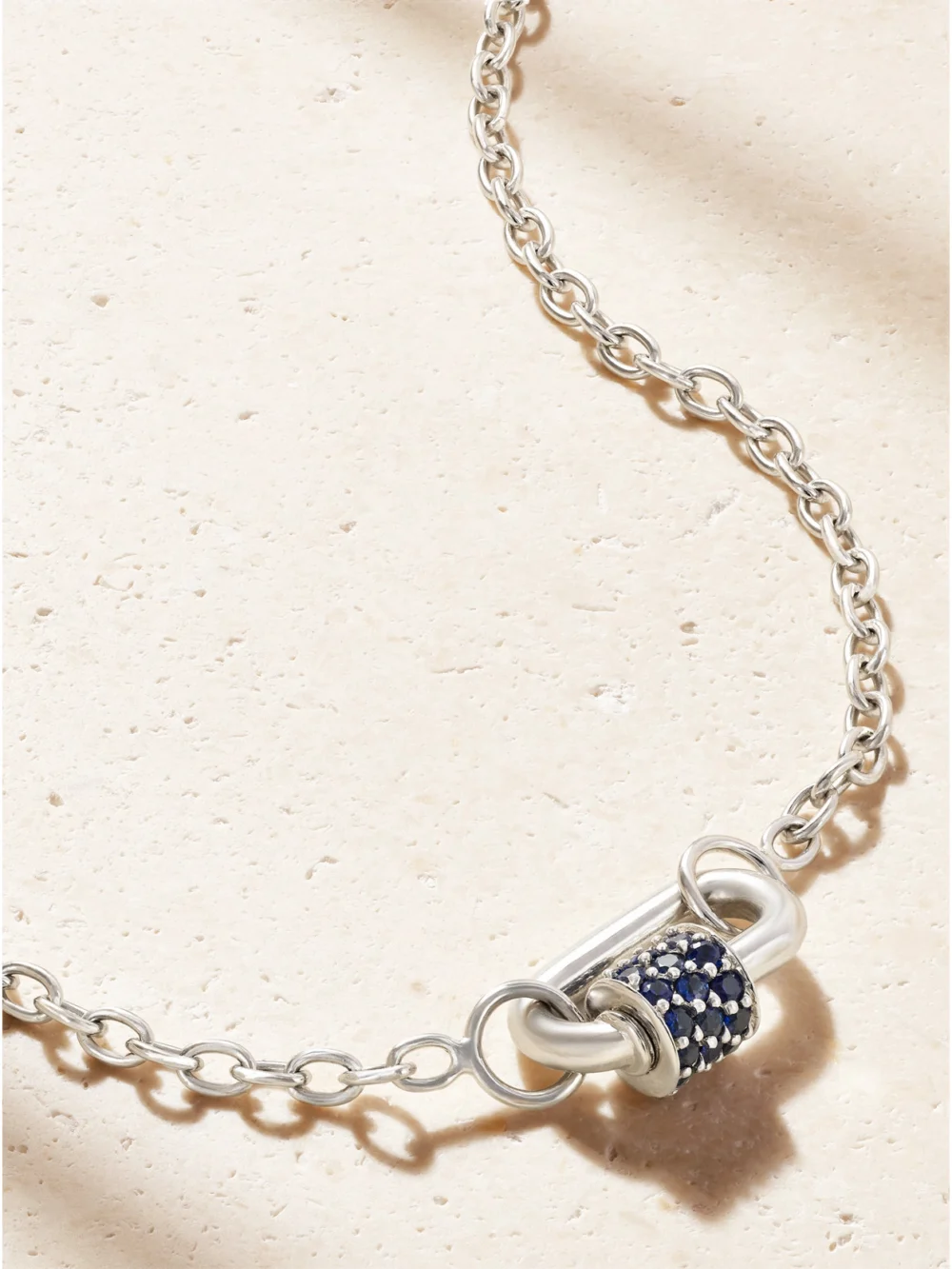 Close-up detail of the Marla Aaron Pulley and Chubby Babylock 14-karat White Gold Sapphire Necklace