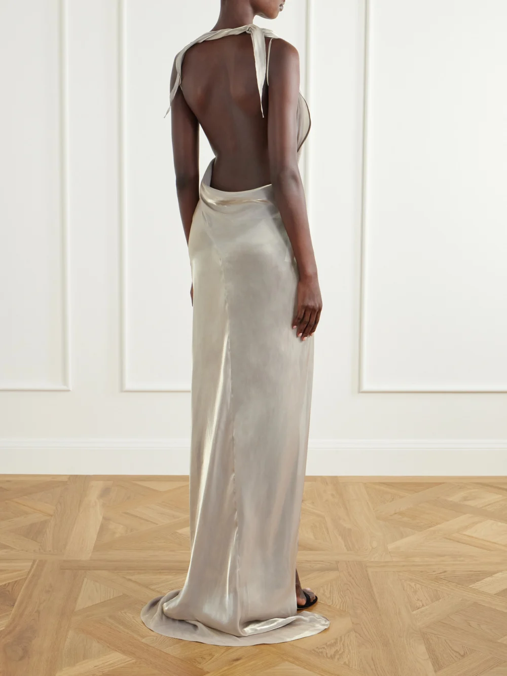 Back view of the Maticevski Glow Up Draped Metallic-satin Gown