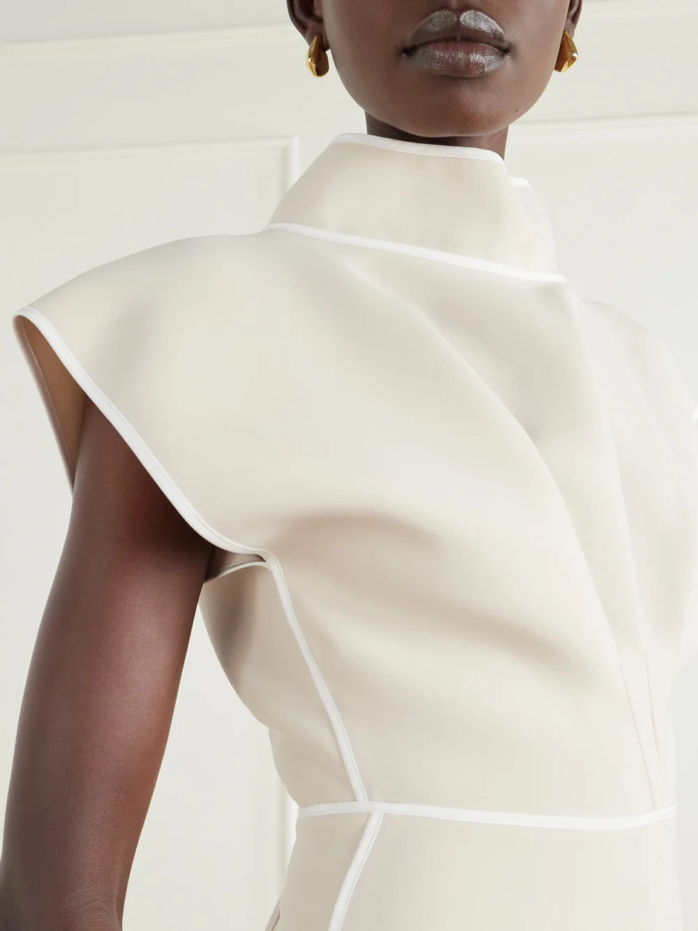 Close-up detail of the Maticevski Pageant Paneled Crepe Midi Dress