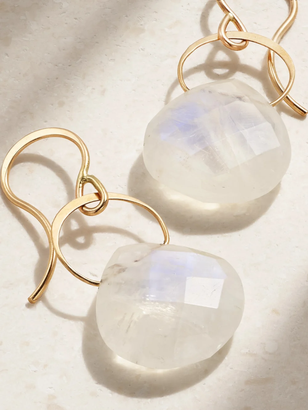 Close-up detail of the Melissa Joy Manning 14-karat Gold Moonstone Earrings