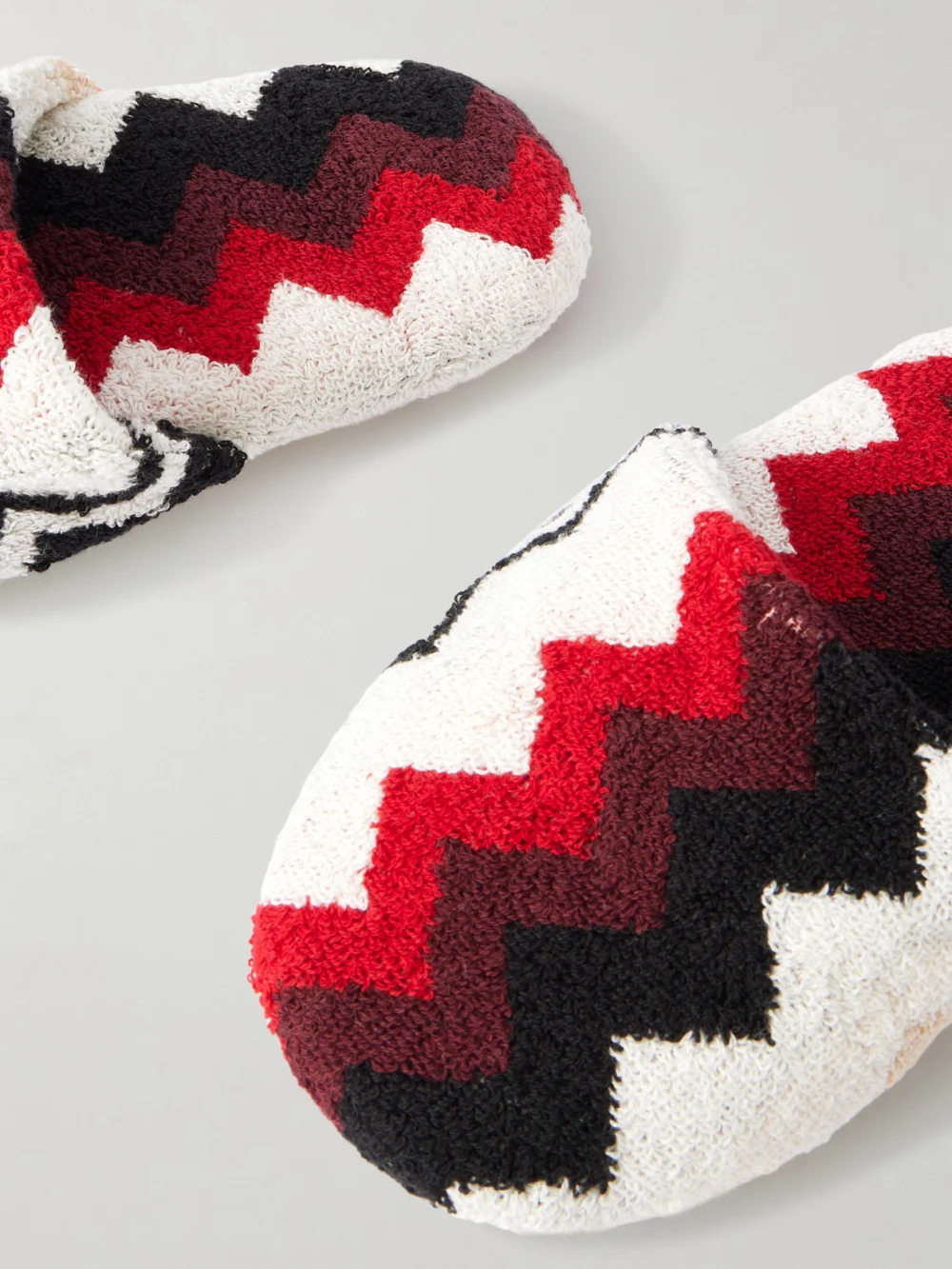 Close-up detail of the Missoni Home Striped Cotton-terry Slippers