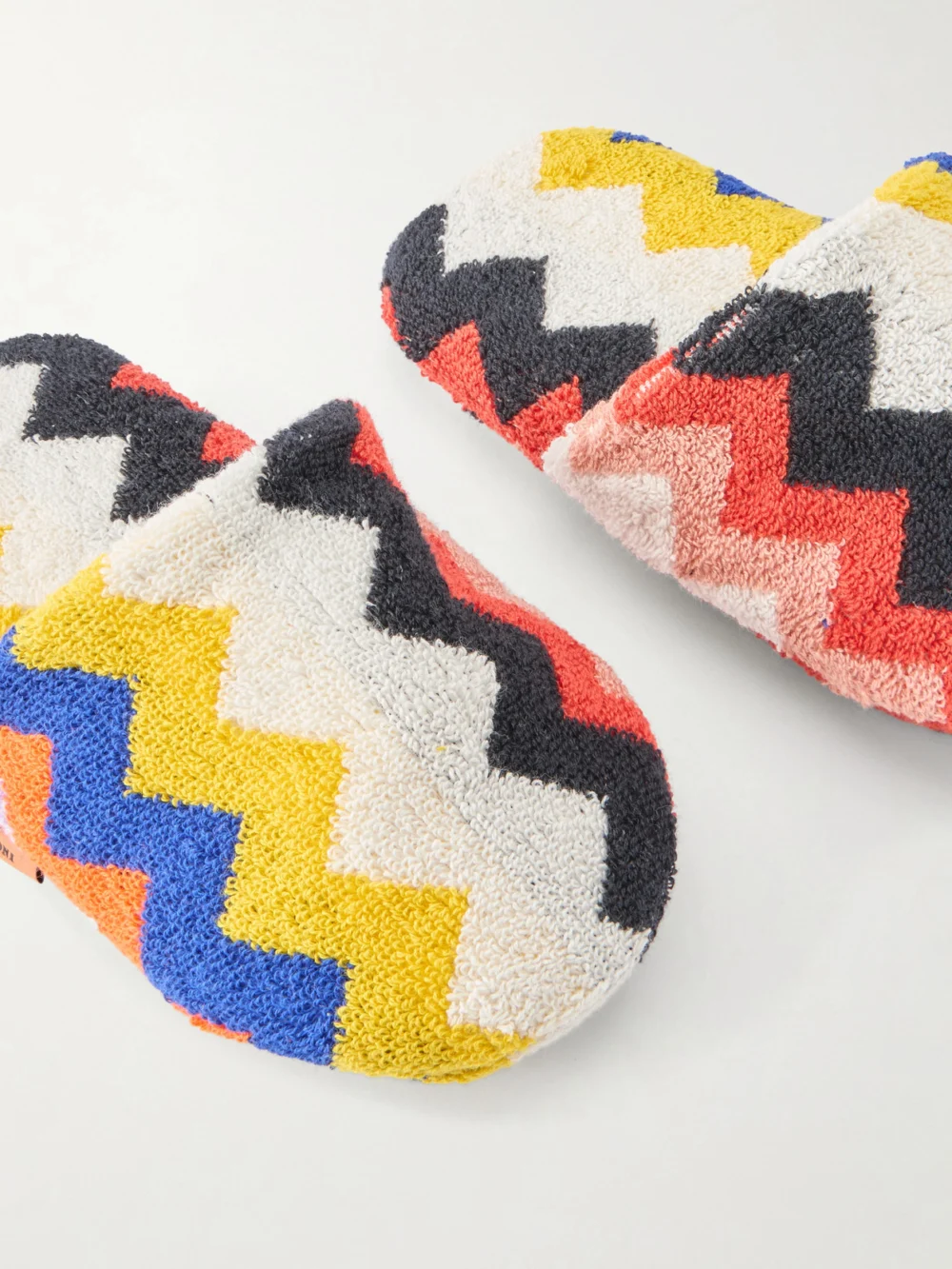 Close-up detail of the Missoni Home Striped Cotton-terry Slippers