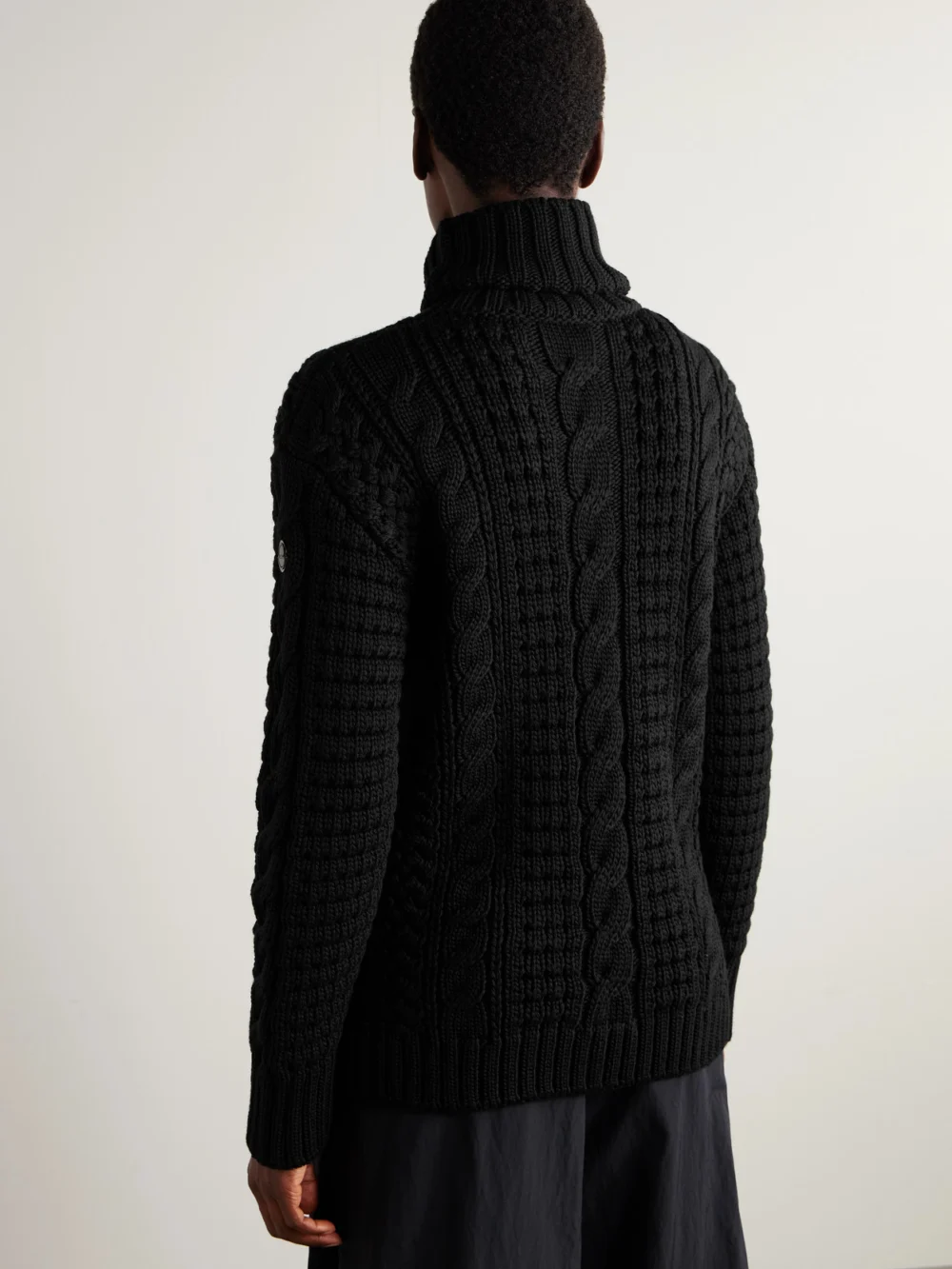 Back view of the Moncler Genius + Edward Enninful Cable-knit Wool Turtleneck Sweater