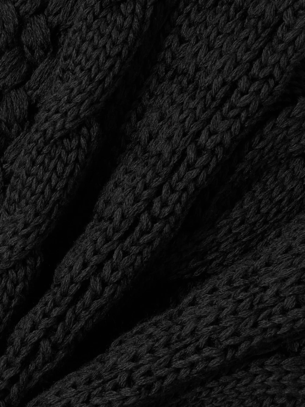 Close-up detail of the Moncler Genius + Edward Enninful Cable-knit Wool Turtleneck Sweater