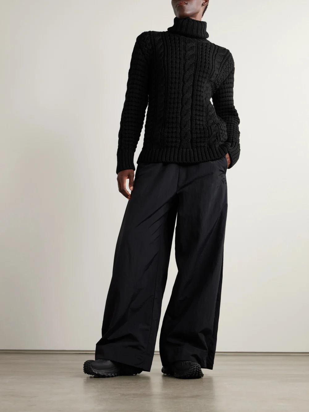 Moncler Genius + Edward Enninful Cable-knit Wool Turtleneck Sweater, worn by a model