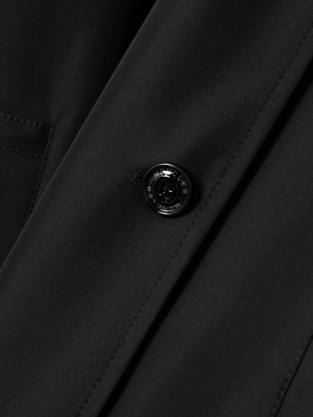 Close-up detail of the Moncler Genius + Edward Enninful Zake Belted Double-breasted Shell Trench Coat
