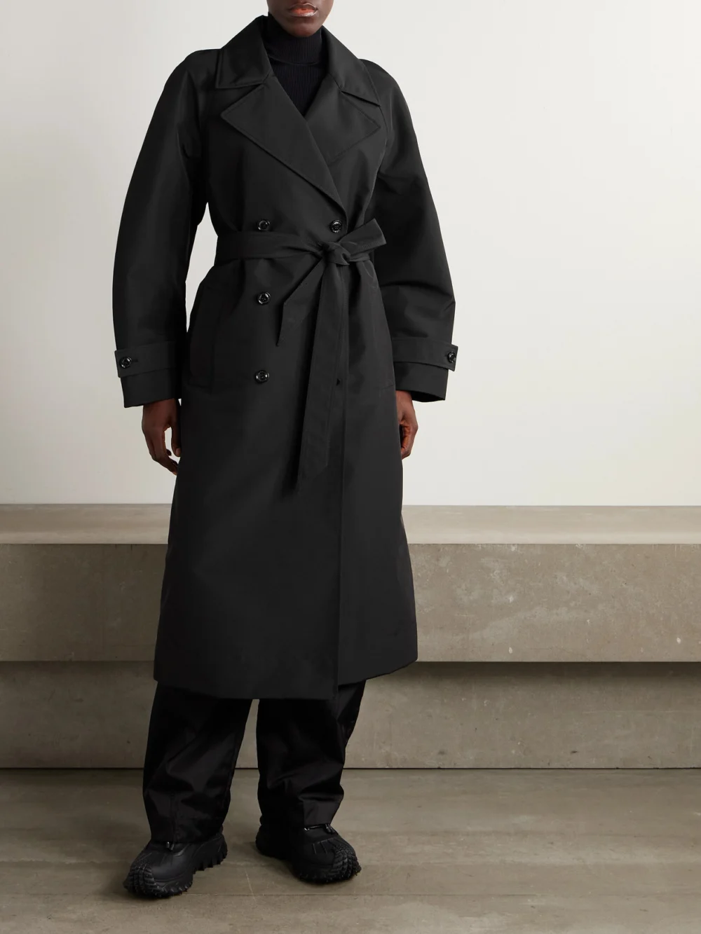 Moncler Genius + Edward Enninful Zake Belted Double-breasted Shell Trench Coat, worn by a model