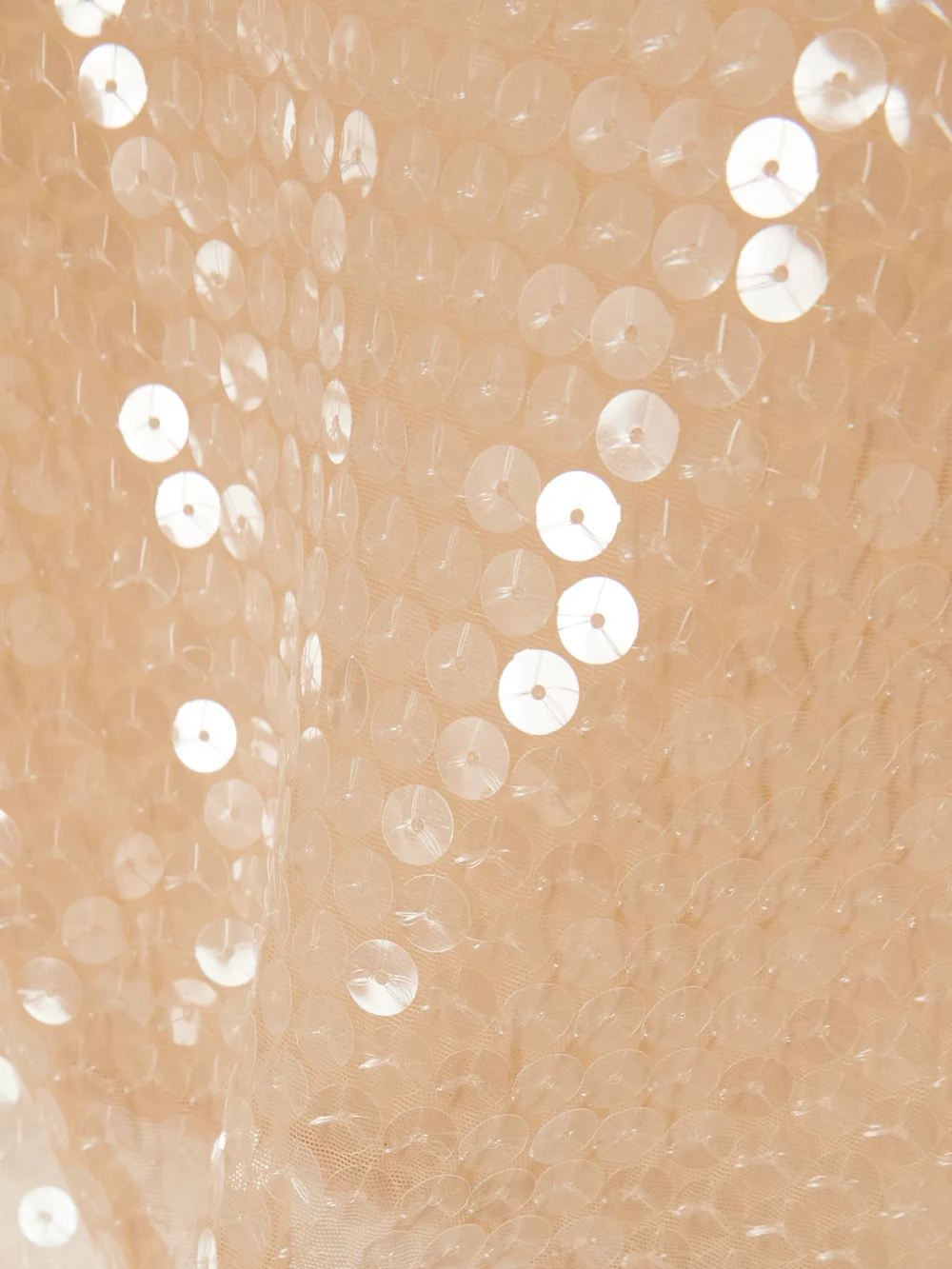 Close-up detail of the Mugler Cropped Sequined Stretch-tulle Top
