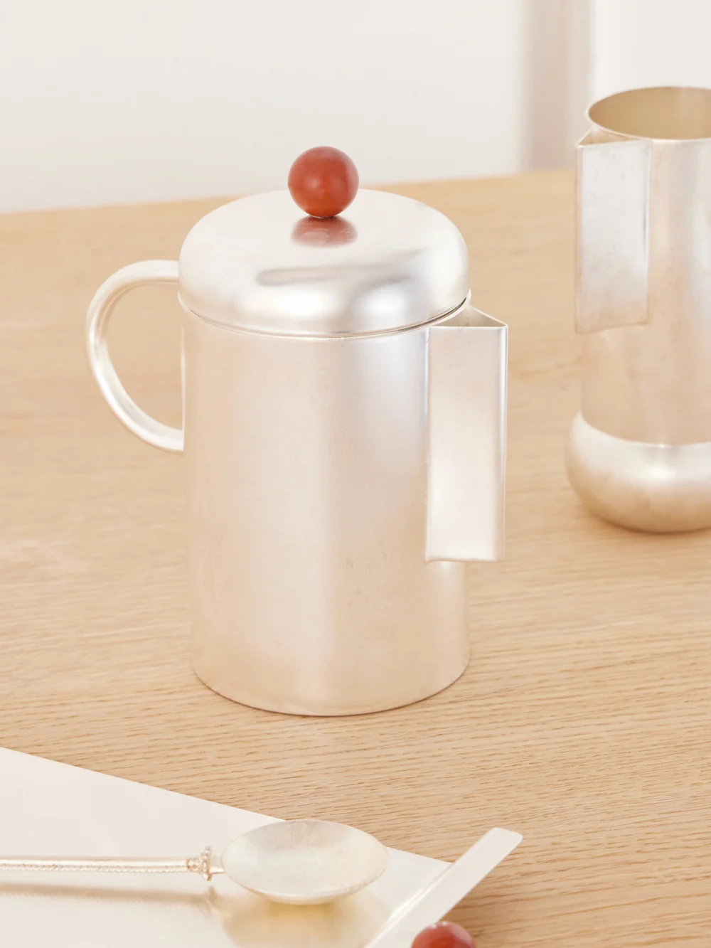 Natalia Criado Simple Silver-plated and Stone Coffee Pot, styled view