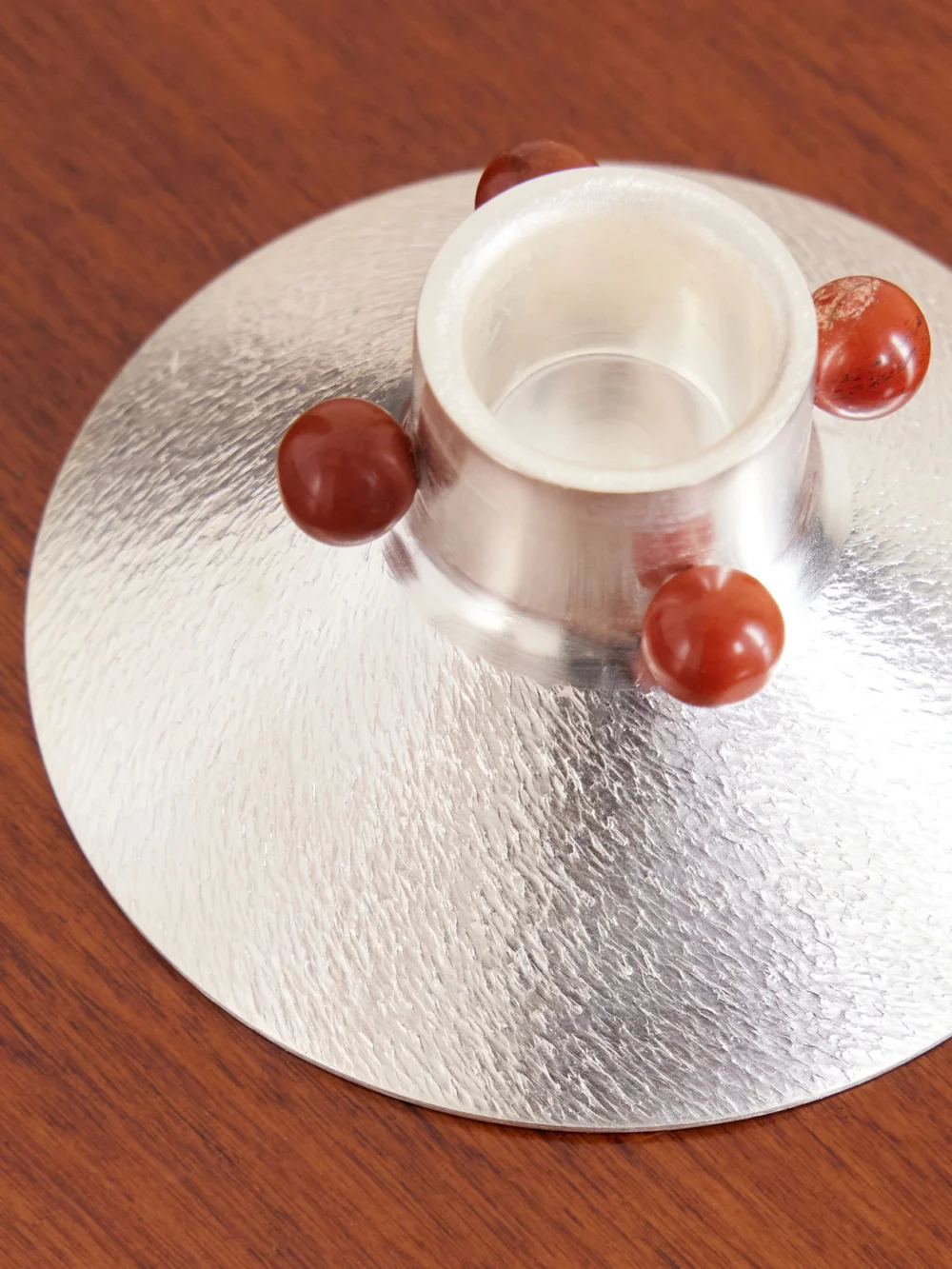 Close-up detail of the Natalia Criado + Vesper Voyage Axis Silver-plated and Stone Candle Holder