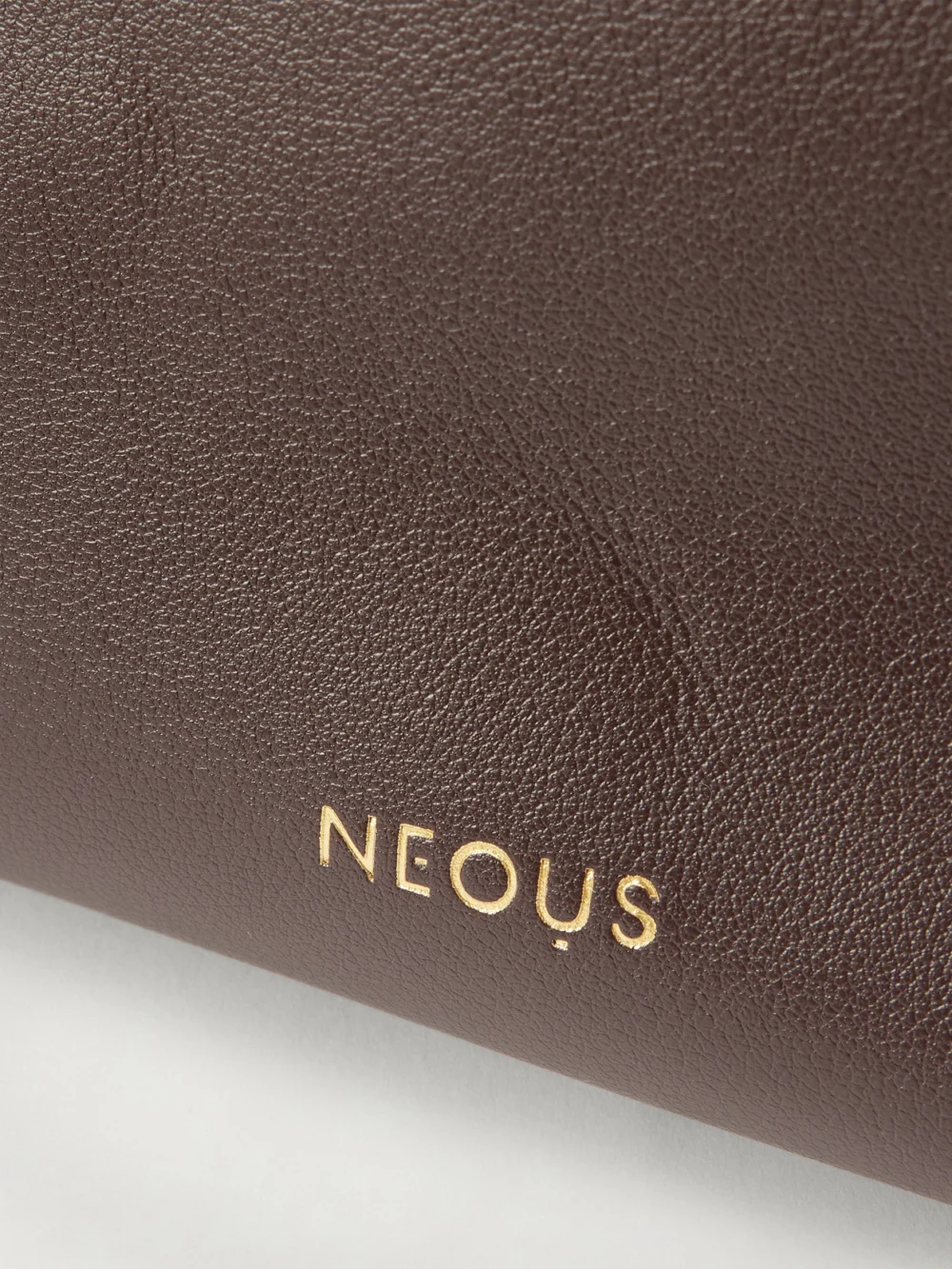 Close-up detail of the Neous Scorpius Leather Tote