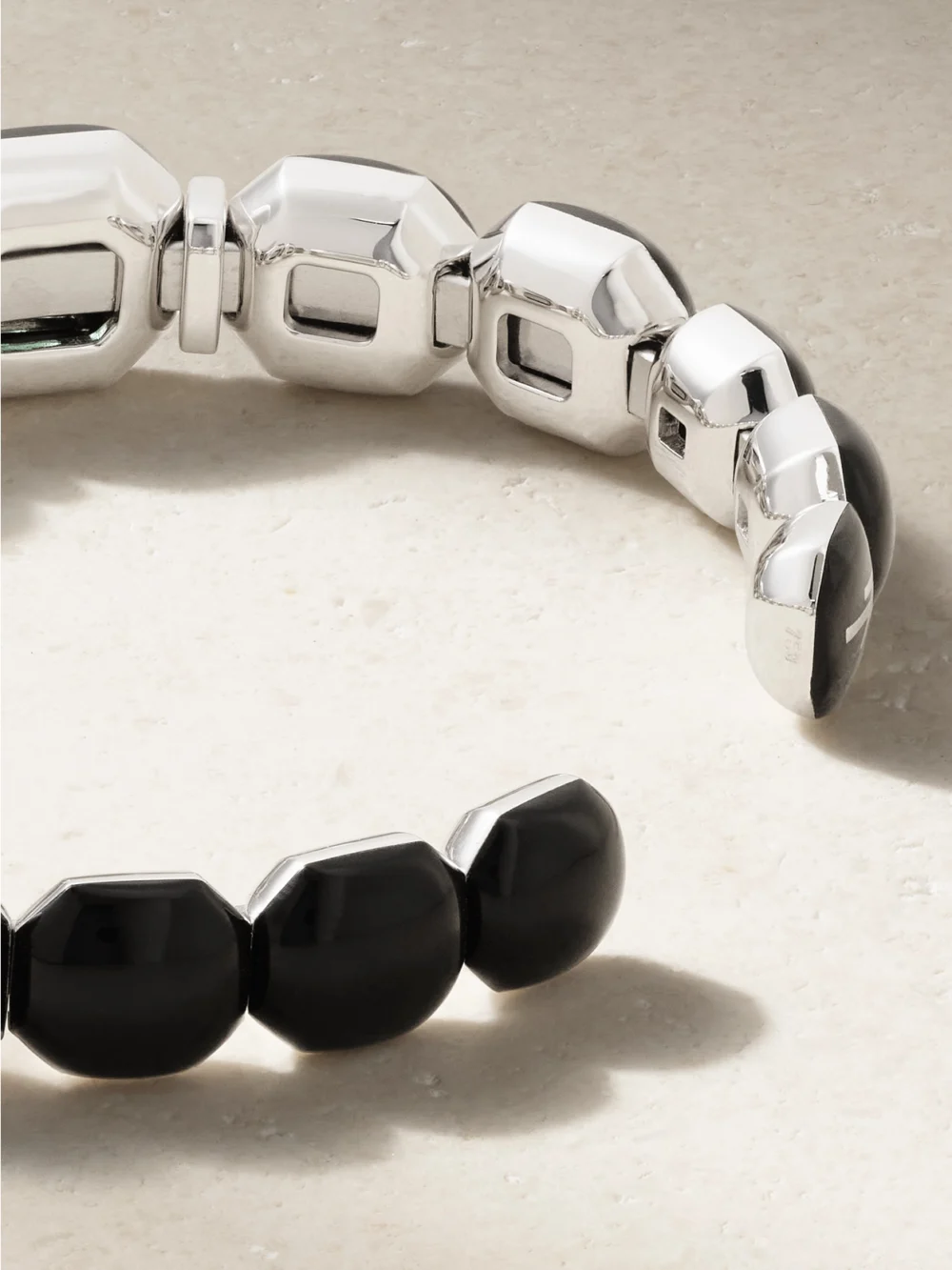 Back view of the Nikos Koulis Oui 18-karat White Gold, Emerald, Diamond and Enamel Bangle