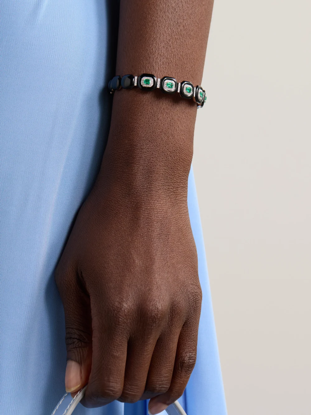 Nikos Koulis Oui 18-karat White Gold, Emerald, Diamond and Enamel Bangle, styled view