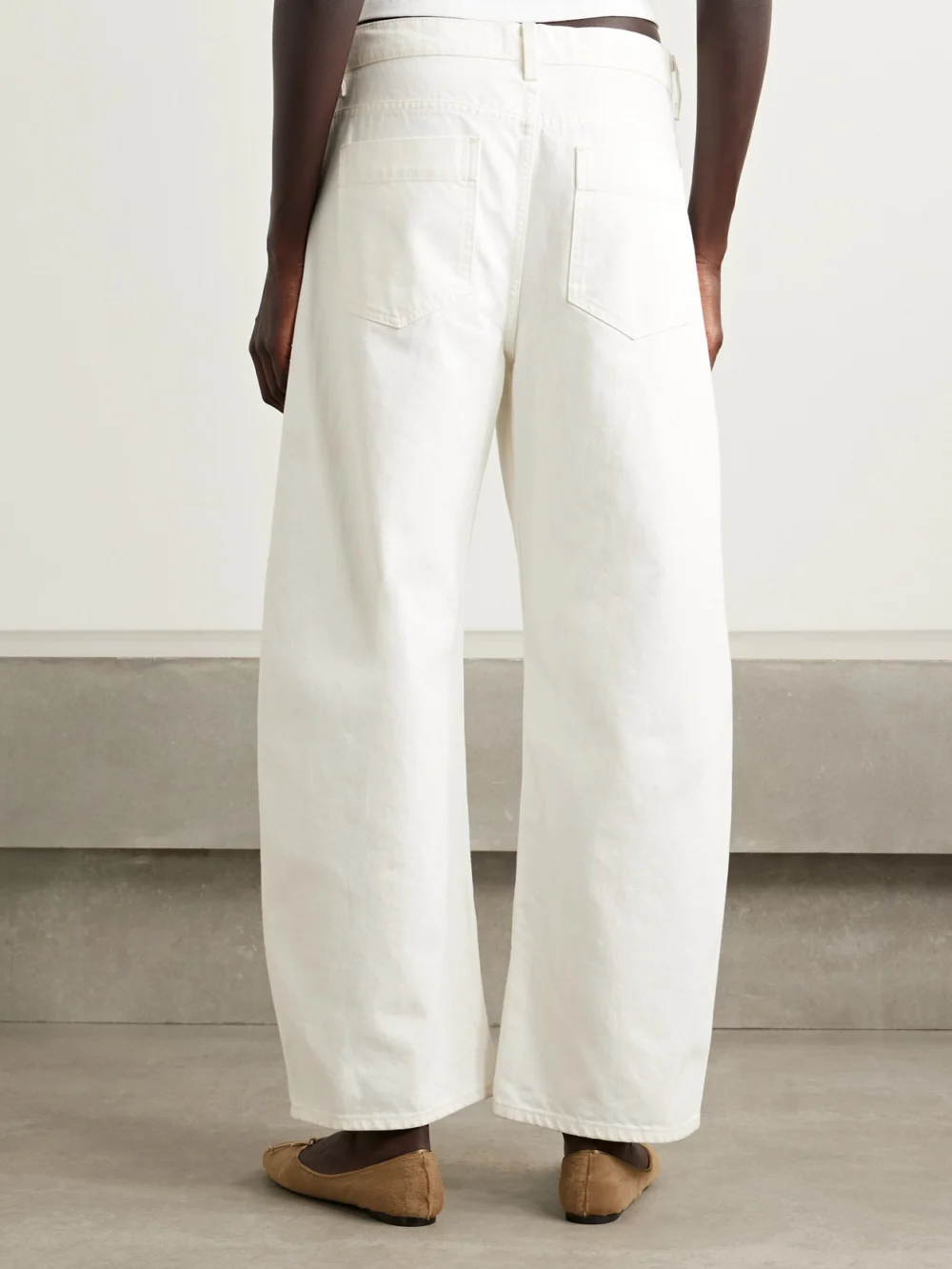 Back view of the Nili Lotan Tribeca High-rise Barrel-leg Jeans