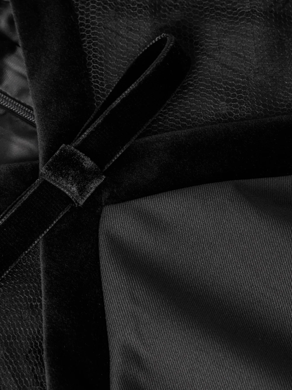 Close-up detail of the Nina Ricci Bow-detailed Velvet-trimmed Polka-dot Tulle and Wool-gabardine Mini Dress