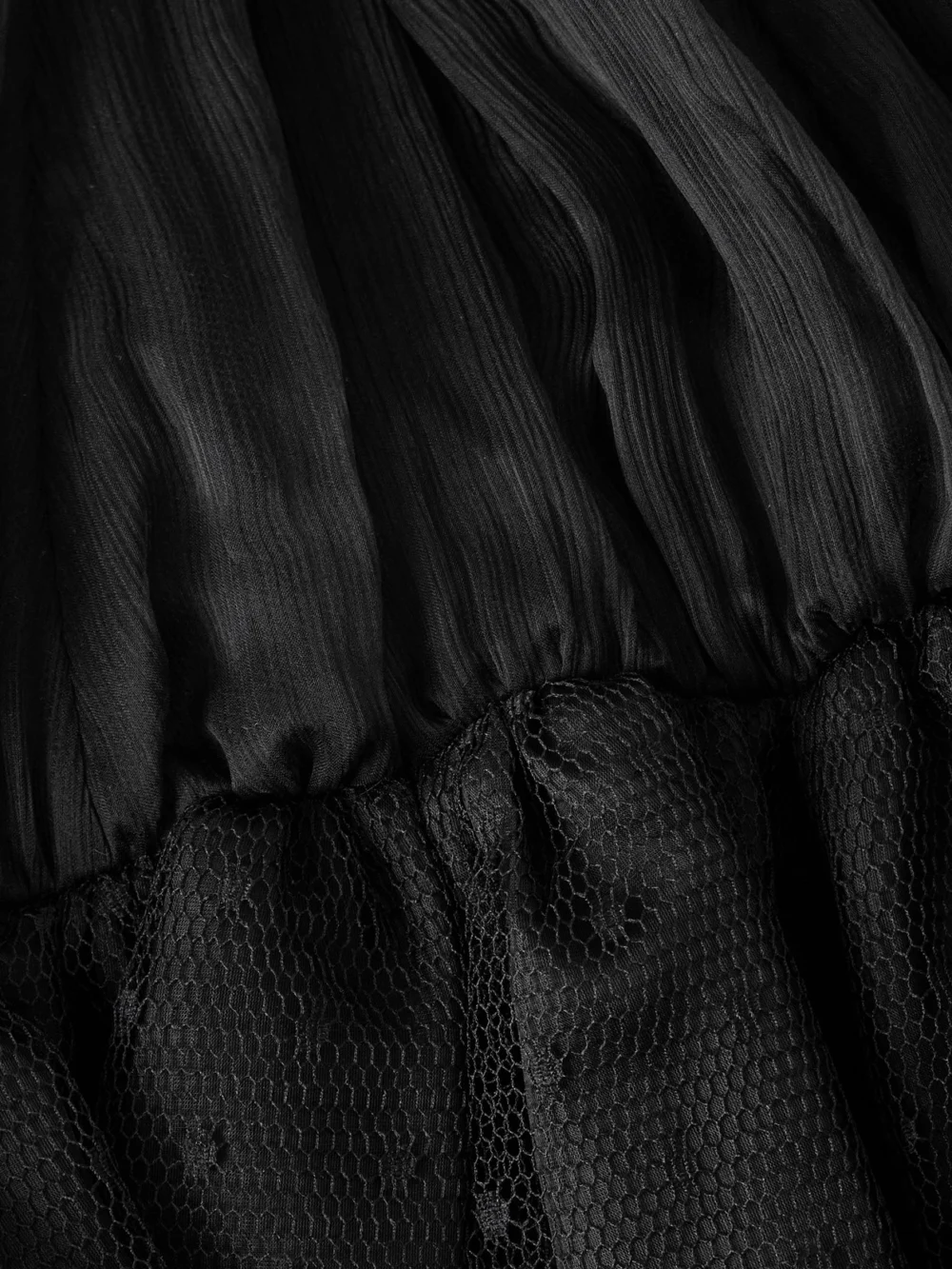 Close-up detail of the Nina Ricci Halterneck Ruffled Crinkled Silk-chiffon and Polka-dot Mesh Mini Dress