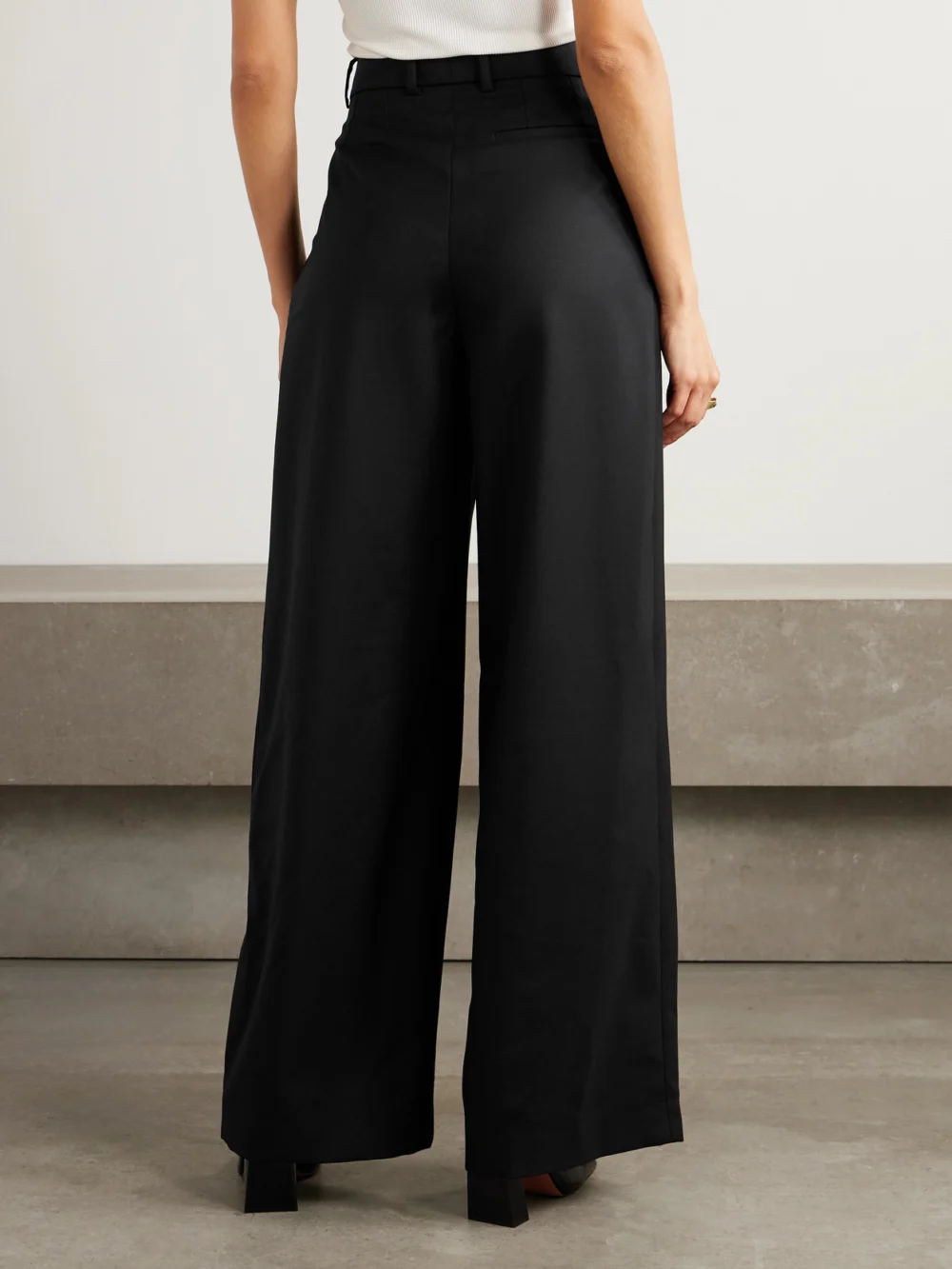 Back view of the Nina Ricci Pleated Wool-gabardine Wide-leg Pants