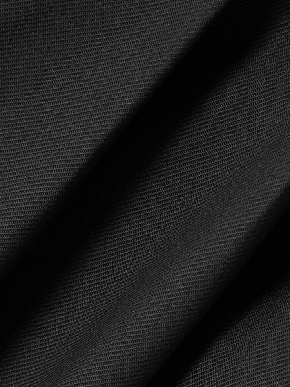 Close-up detail of the Nina Ricci Pleated Wool-gabardine Wide-leg Pants