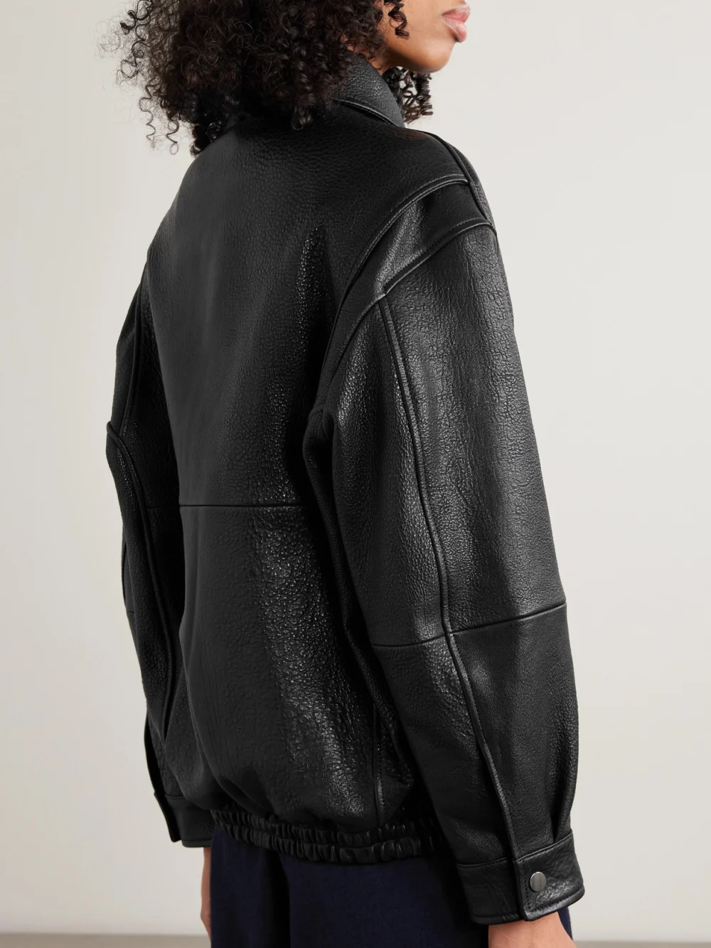 Back view of the Nour Hammour Doran Paneled Textured-leather Jacket