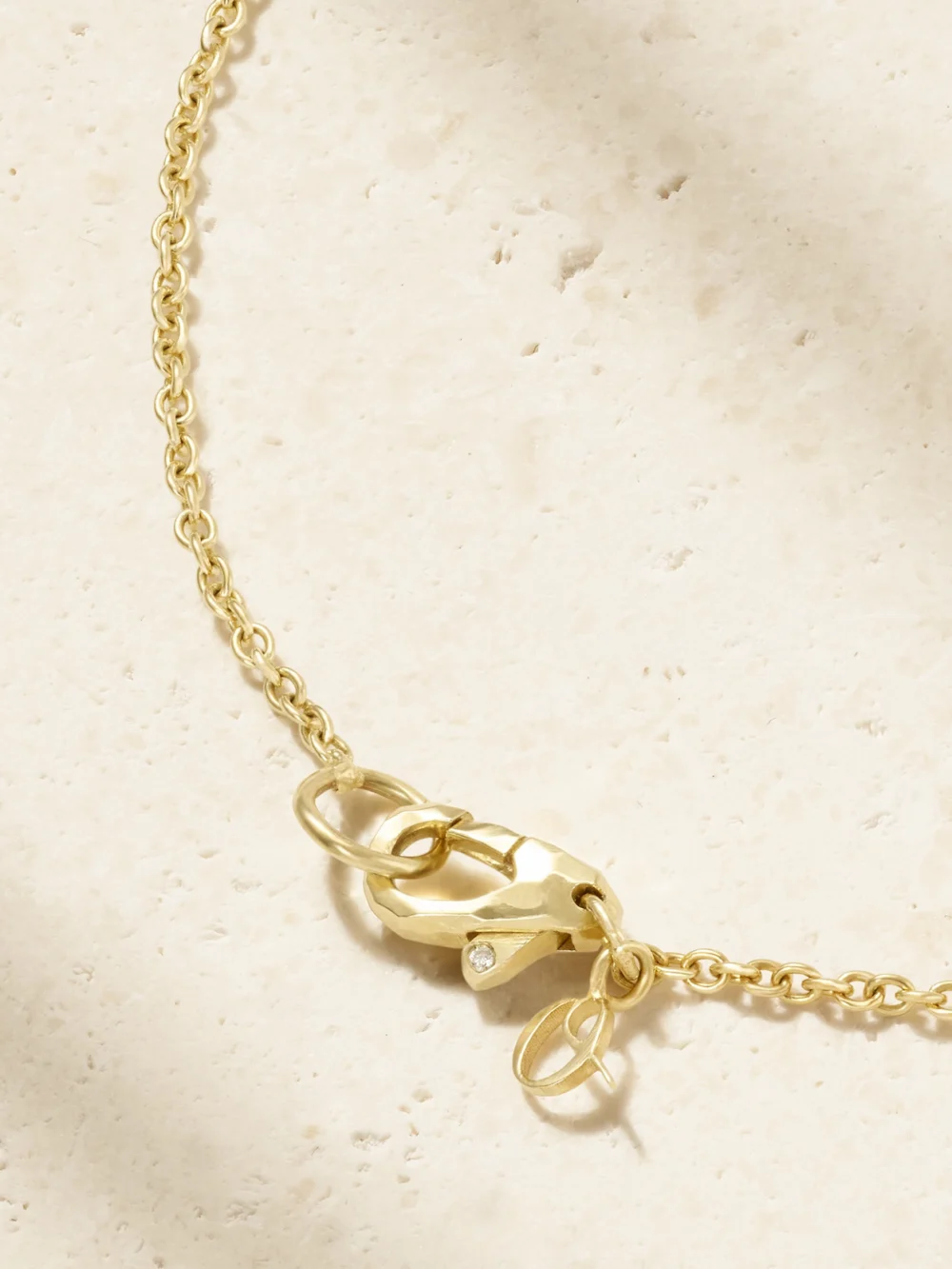 Back view of the Octavia Elizabeth By the Pinch 18-karat Gold Emerald Necklace