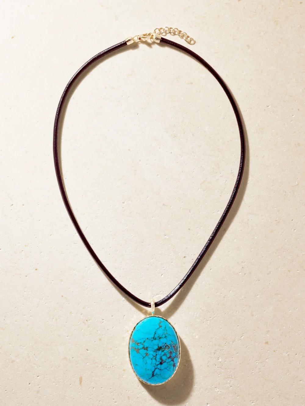 Close-up detail of the Octavia Elizabeth Jumbo Hidden Gem 18-karat Gold, Turquoise and Leather Necklace