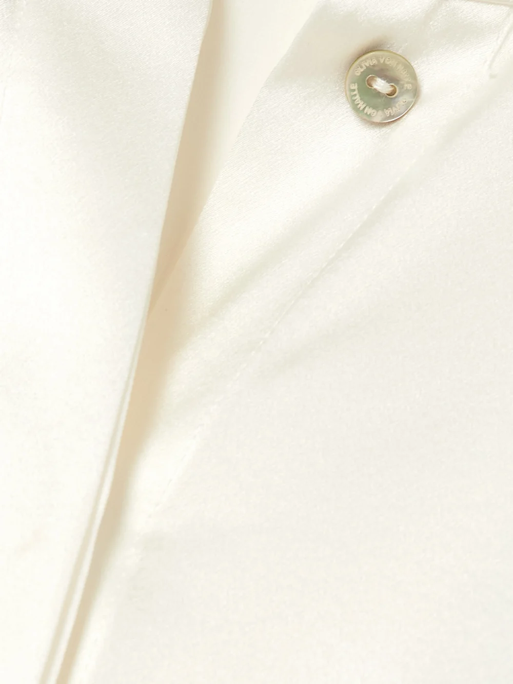Close-up detail of the Olivia von Halle Bacall Silk-satin Pajama Set
