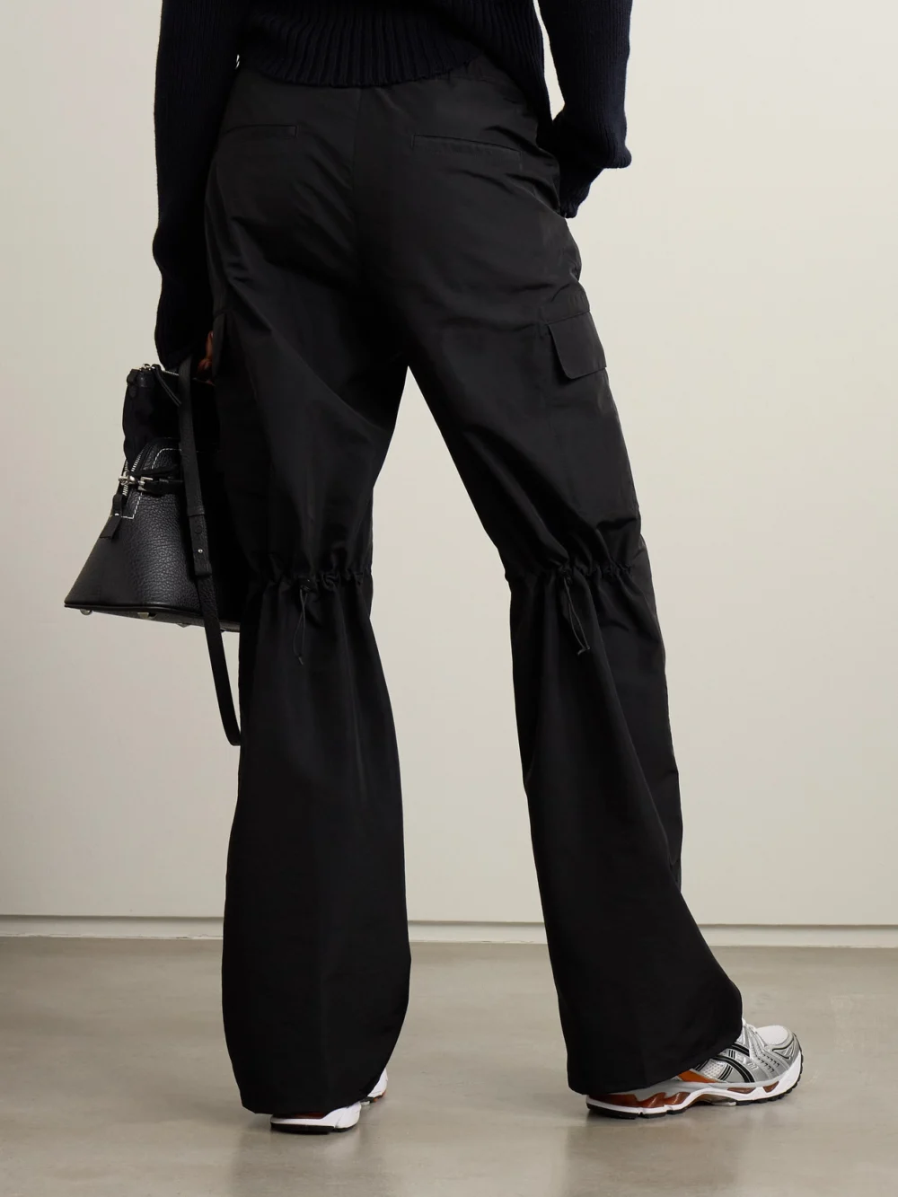 Back view of the Our Legacy Alloy Shell Wide-leg Cargo Pants