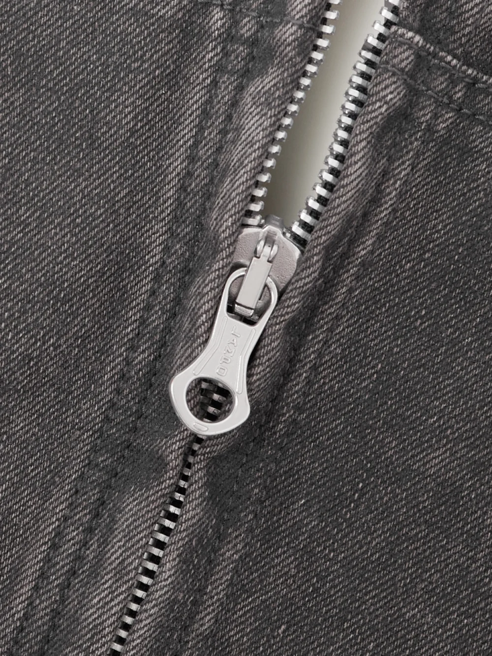 Close-up detail of the Our Legacy Cropped Hooded Denim Jacket