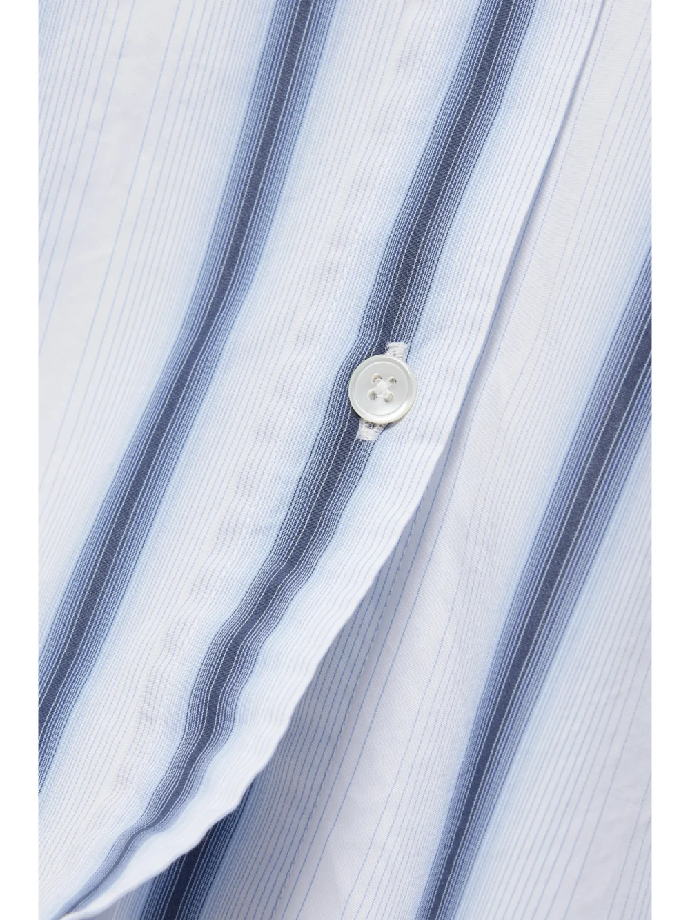 Close-up detail of the Our Legacy Daisy Striped Cotton-poplin Shirt